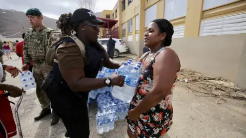 Paul Blake/BBC Water being given to residents in the British Virgin Islands