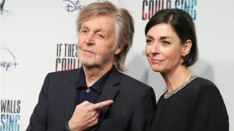 Reuters Paul and Mary McCartney
