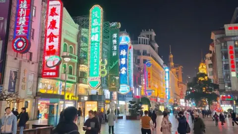 NurPhoto ''China's first commercial street,'' at night in Shanghai