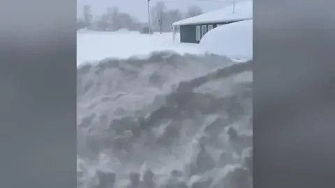 Snow covered homes