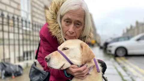 Elaine MacKenzie and her dog Tessy