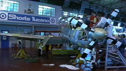 Workers at the Shorts factory in Belfast building a Tucano plane in 1987