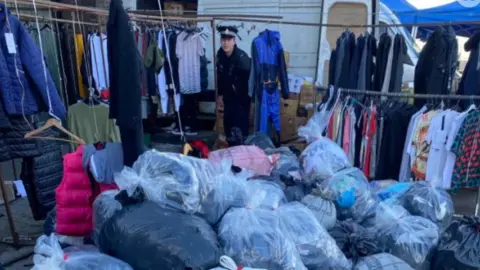 GMP The fake clothes was seized as part of Operation Vulcan - a clampdown on counterfeit goods