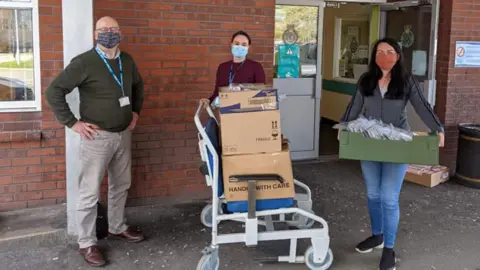 Hugs for Heroes Handing over goody bags to NHS staff