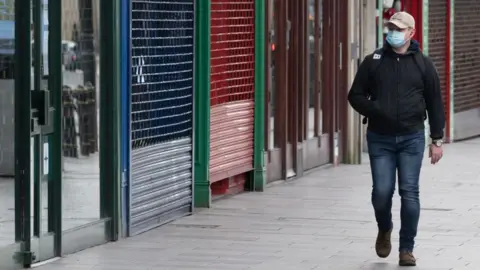 A man in a face mask