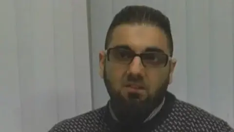 Met Police Still from a video clip showing Usman Khan praising Learning Together