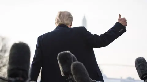 Getty Images Trump gives thumbs up