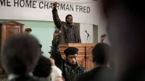 Warner Bros LaKeith Stanfield (foreground) and Daniel Kaluuya (rear) in Judas and the Black Messiah