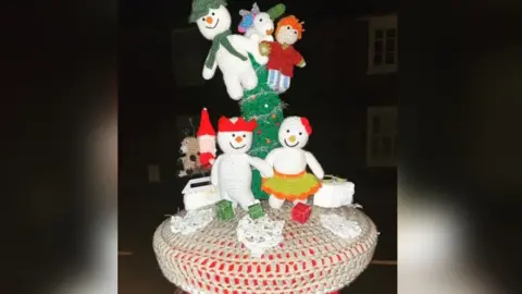 The Secret Yarn Bomber Knitted and crocheted Christmas scene