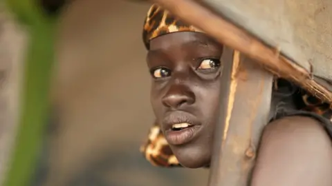 Reuters A South Sudanese refugee girl is seen at the Nguenyyiel refugee camp during a visit by US Ambassador to the UN Nikki Haley (not pictured) to the Gambella Region, Ethiopia October 24, 2017.