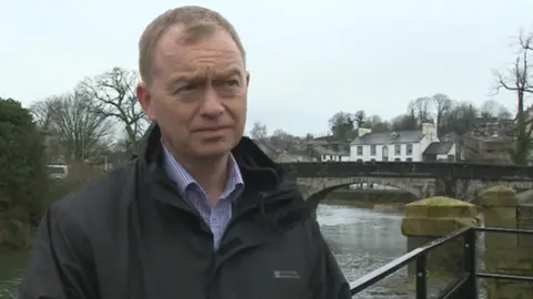 Tim Farron speaking to the BBC