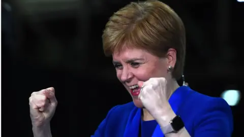 AFP Nicola Sturgeon celebrates the SNP's win in Dunbartonshire East