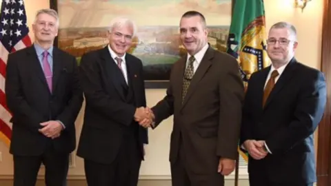 Jersey Law Officers’ Department Staff from Jersey and the US Department of Homeland Security