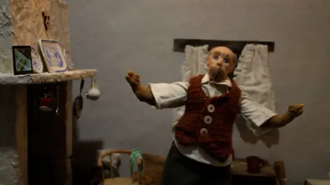 CULTURE VANNIN A still from the film, which shows the famer dancing in front of the fireplace.