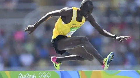 AFP Uganda's Benjamin Kiplagat competes in the Men's 3000m Steeplechase Round 1 during the athletics event at the Rio 2016 Olympic Games at the Olympic Stadium in Rio de Janeiro on August 15, 2016.