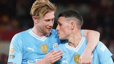 Kevin de Bruyne and Phil Foden