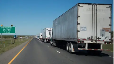 Getty Images Trucks queuing near the US-Mexico border in Laredo
