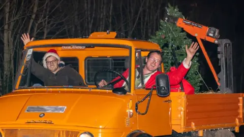 Roman Turney Photography Two people in a tractor
