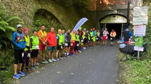 Reuters Runners outside Combe Down tunnel