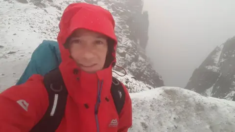 Andy Cole/PA Andy Cole on Ben Nevis