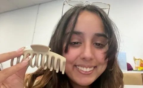 Jeena Panesar Jeena Panesar holding a similar hair claw clip