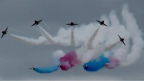 Arran Hughes A dramatic shot of the Red Arrows