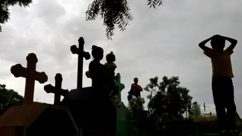 INTI OCON/Getty Images Relatives and friends of 16-year old student Matt Romero --shot dead yesterday during clashes with riot police and paramilitaries within a protest against President Daniel Ortega-- attend his burial,