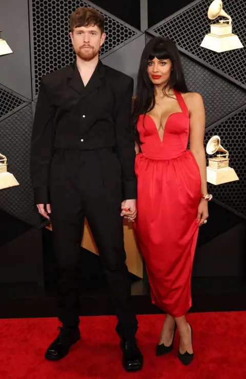 Reuters James Blake and Jameela Jamil at the Grammys