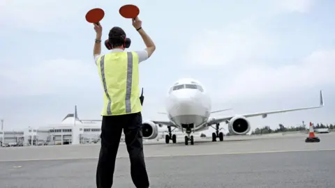 Getty Images Airport staff