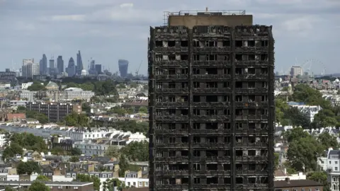 Getty Images Grenfell Tower with the London skyline in the background