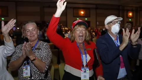 Reuters Supporters hear Donald Trump speak at the Conservative Political Action Conference in Orlando, February 28, 2021