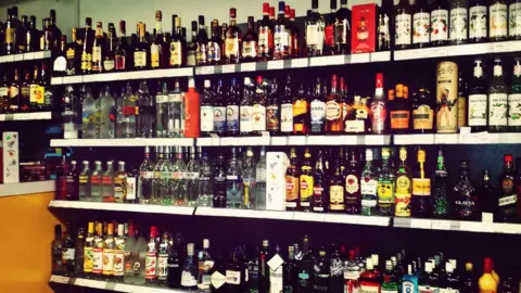 Getty Images Alcohol shelves