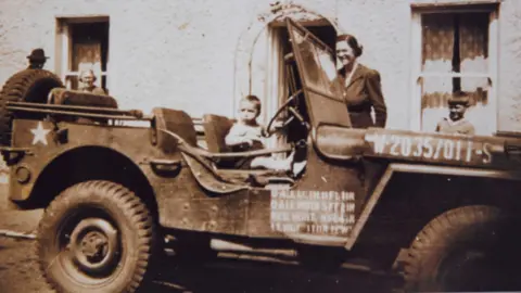 NI War Memorial Child in US jeep