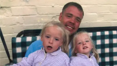 Family handout Tony Browne with his twins