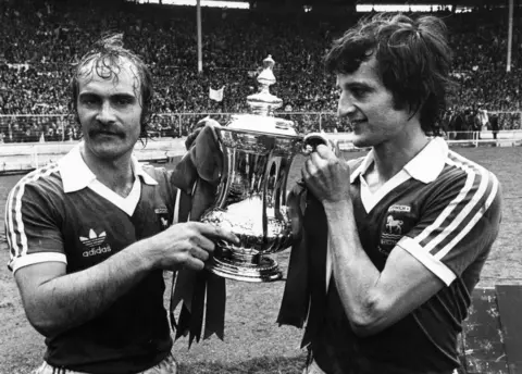 Getty Images Mick Mills and Roger Osborne with the FA Cup