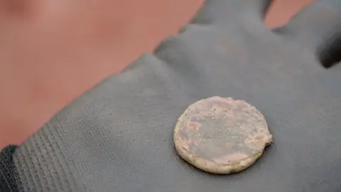 Exeter City Council Roman coin found at the site