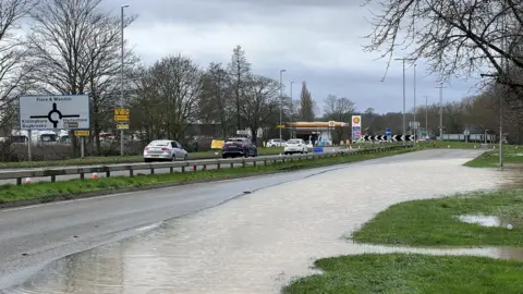 Kris Holland/BBC Flooding on A4500