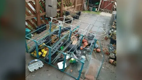 Grow Outside Toppled garden shelf