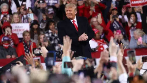 Getty Images Donald Trump among supporters in Georgia