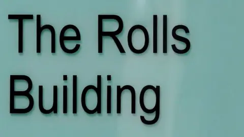Nick Ansell/PA Media Sign for for the Rolls Building in London