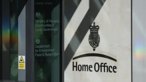 A picture of the exterior of the Home Office headquarters in London