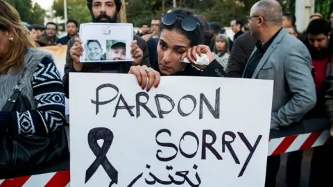 AFP Moroccans attend a vigil for the murdered tourists