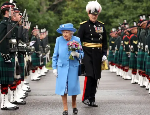 Getty Images Alastair Bruce with the Queen