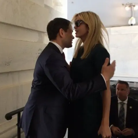 @yasher/Twitter Picture of awkward interaction between Sen> Marco Rubio and Ivanka Trump