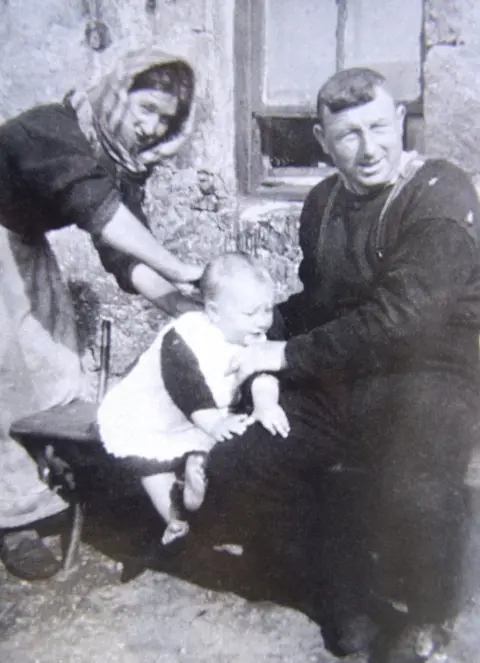 NAtional Trust for Scotland Mary Gillies with husband John and son Norman John