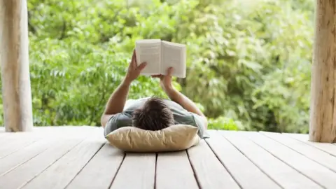 Getty Images Man reading