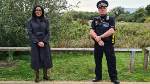 Pinder Chauhan Pinder Chauhan with a police officer at Pineham Locks