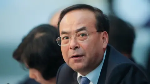 Getty Images Sun Zhengcai attends the Chongqing delegation's group meeting in 2017