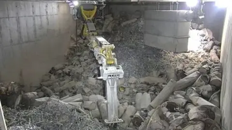 Magnox Nuclear waste being extracted by mechanical arm