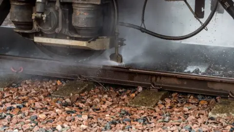 Network Rail Train cleaning tracks